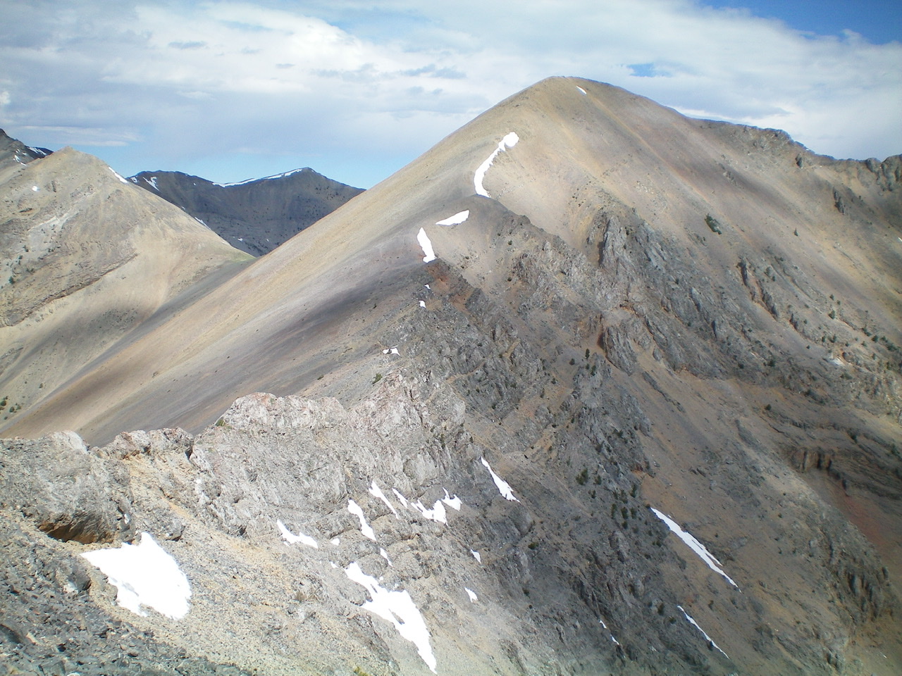 The Southeast Ridge of the Knoll (summit is just right of center) as viewed from low on the Northwest Ridge of Umpleby Peak. Livingston Douglas Photo 