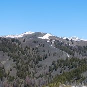 Trouble Peak viewed from Peak 8100. South Dollarhide Peak is the snow covered summit behind Trouble Peak.