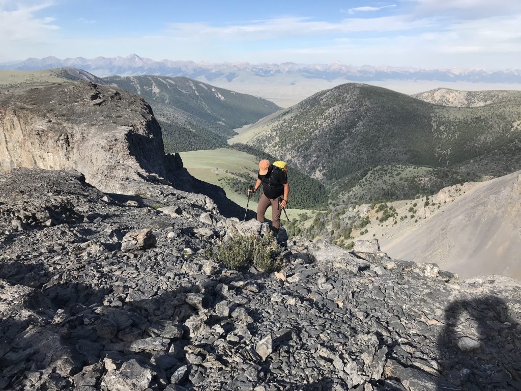 Mike Fox gaining the top of the Tower Rib. The tower is located in the upper left hand corner.