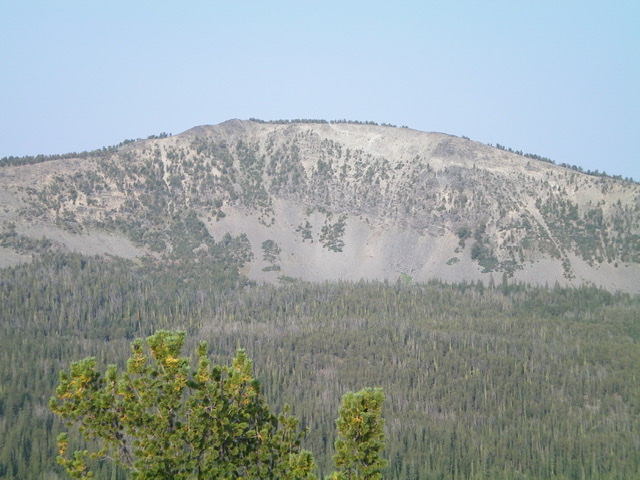 Goldstone North and its rugged east face. The summit is the dark brown hump just left of center. Livingston Douglas Photo 