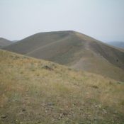 Peak 8871 (center) and its northeast ridge as viewed from the West Modoc/Middle Modoc ridge crest to its northeast. Livingston Douglas Photo