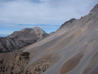 View north from 10,000 foot saddle toward Leatherman Pass and White Cap Peak.