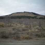 Peak 5820 and its west face/shoulder as viewed from the road junction along North Canyon Road. Notice the rocky summit block. Livingston Douglas Photo