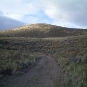 Peak 5380 (dead center) as viewed from the base of the northeast gully near Arbon Valley Road. The summit high point sits behind the hump in the photo. Livingston Douglas Photo