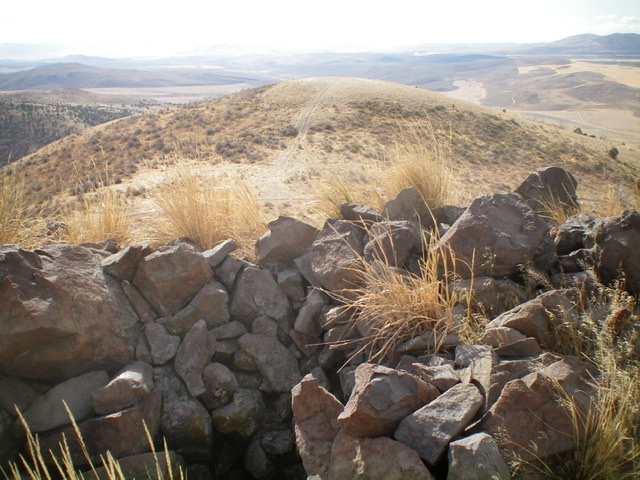 The rock shelter atop Buck Peak, looking down the south ridge. Livingston Douglas Photo 