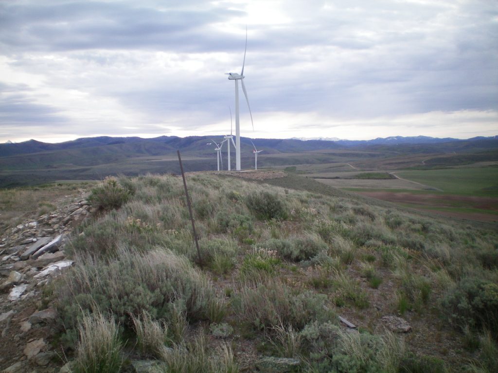 The summit rebar atop Big Horse Butte with Little Horse Butte's windmill behind it. Livingston Douglas Photo