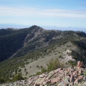 Bloom Benchmark is the high point just left of center, as viewed from the summit of Peak 9877. Livingston Douglas Photo