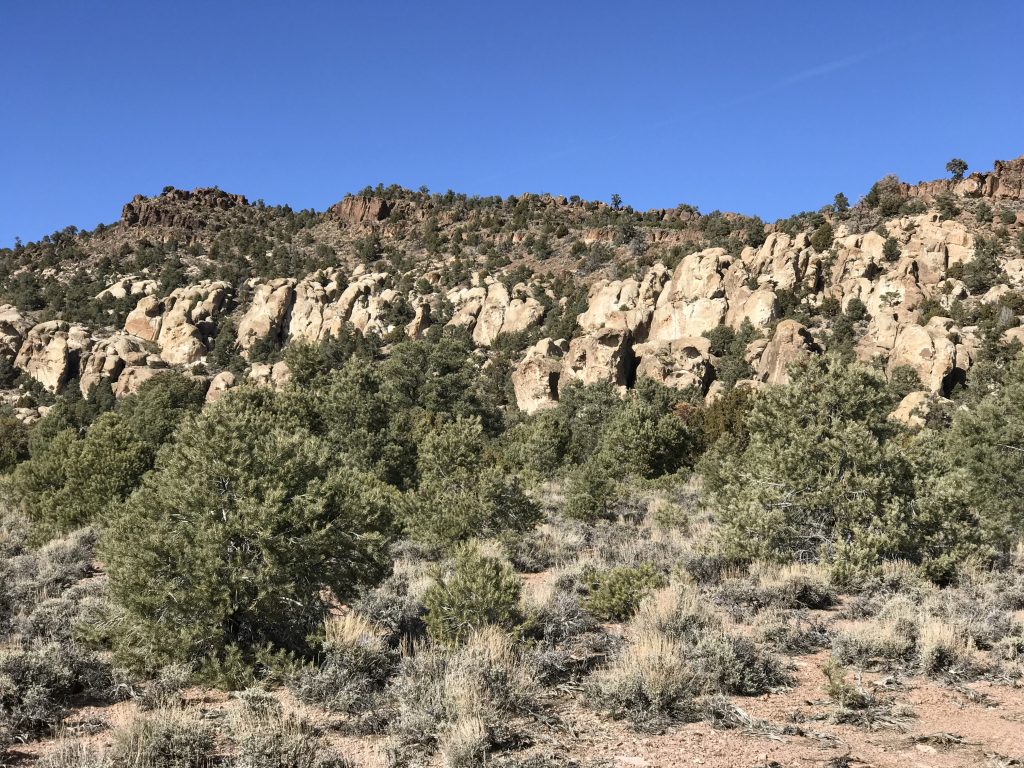 A wide angle view of the boulder cliffs.