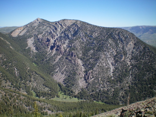 Fritz Peak and its rugged southwest face as viewed from the south. The summit is left of center and its magnificent southeast ridge is on the skyline. Livingston Douglas Photo 