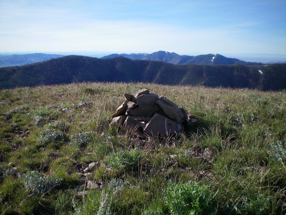 The newly-built cairn atop Peak 8301 with Peak 8074 in the background (the summit is the leftmost of the two humps). Livingston Douglas Photo 