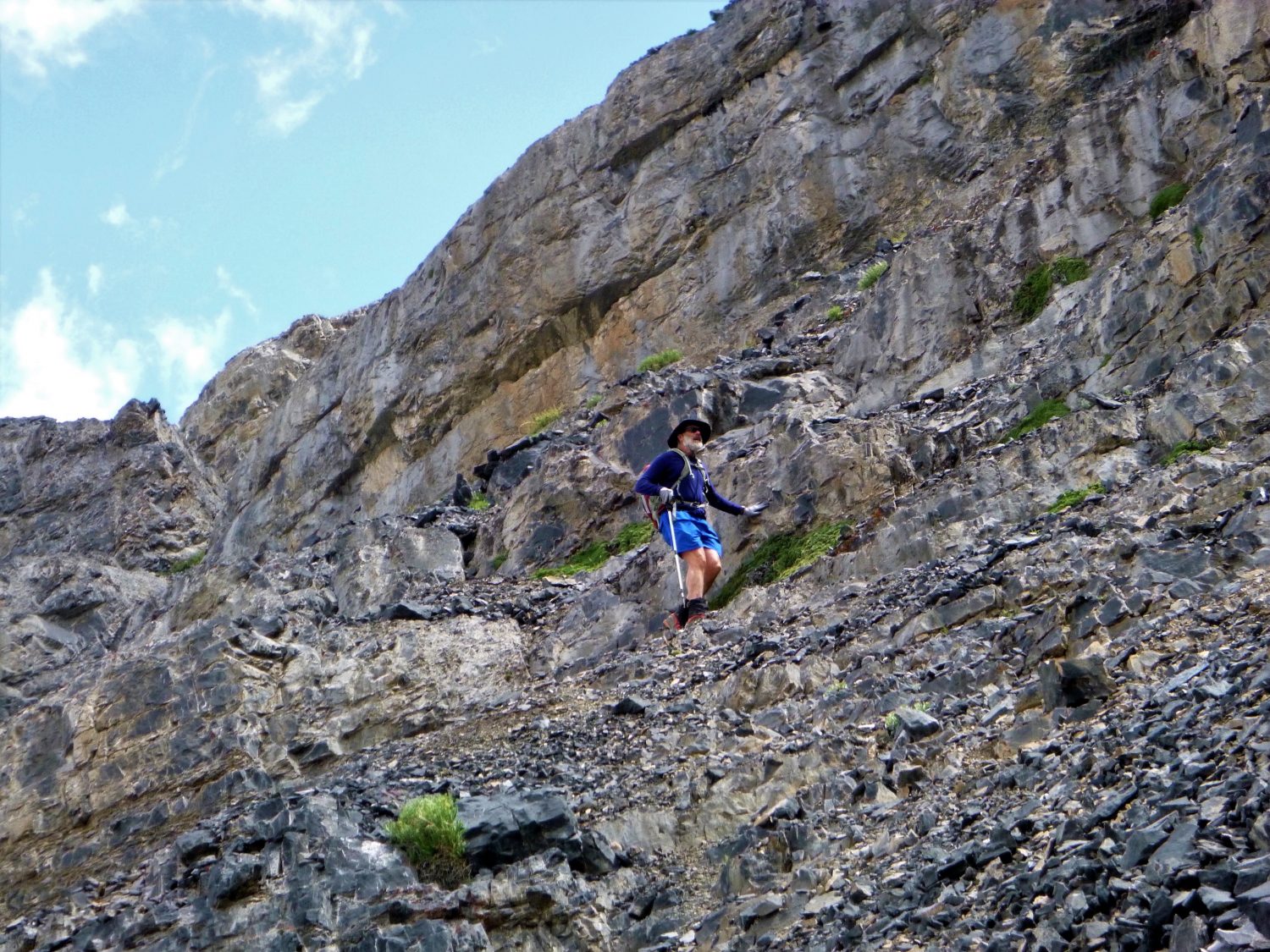 Upon leaving the creek bed, scramble past a short rock band.