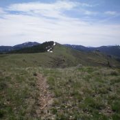 Looking up the final stretch of the northwest ridge at the summit of Peak 7340. Livingston Douglas Photo