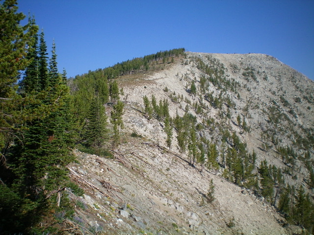 Peak 9737 and its curving southeast ridge. The summit is at far right. Livingston Douglas Photo 