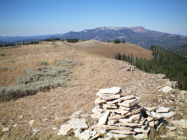The summit cairn atop Peak 8660 with Taylor Mountain in the background. Livingston Douglas Photo 