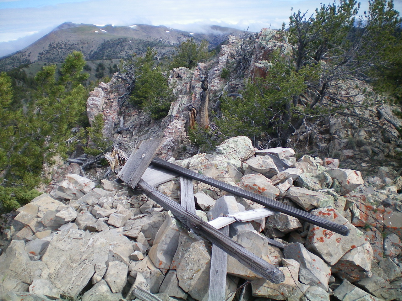 The triangulation posts and summit cairn atop Bloom Benchmark. Livingston Douglas Photo