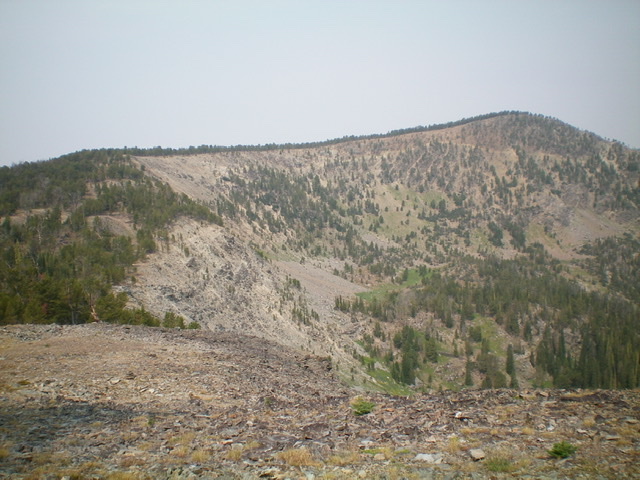 Peak 9766 and its LONG southeast ridge. The summit is right of center. Livingston Douglas Photo 