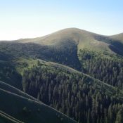 Peak 8780 (the hump right of center) and the undulating, weaving Continental Divide that leads southeast then south to it. Livingston Douglas Photo