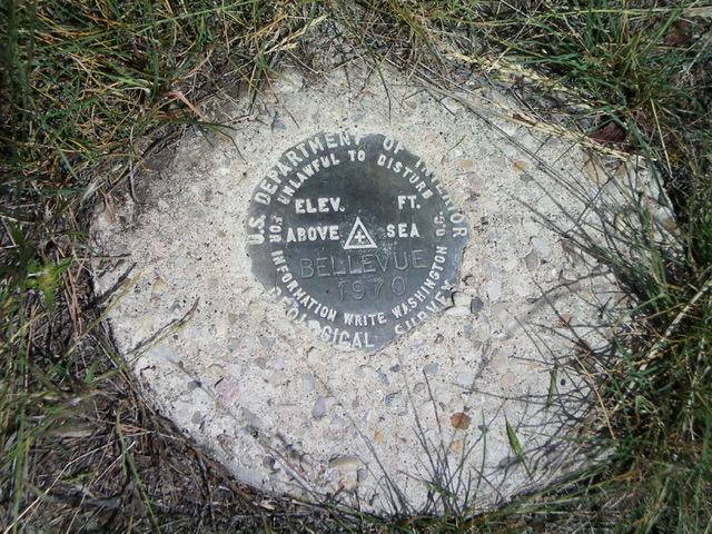 The USGS Benchmark (“Bellevue”) atop Bellevue Benchmark. Livingston Douglas Photo 