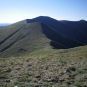 Peak 9284 as viewed from the west along the Continental Divide. The summit is dead-center and dark with shadows. Livingston Douglas Photo