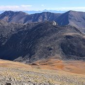 Peak 10648 viewed from the southeast ridge of Ferguson Peak blends in to Massacre Mountain.