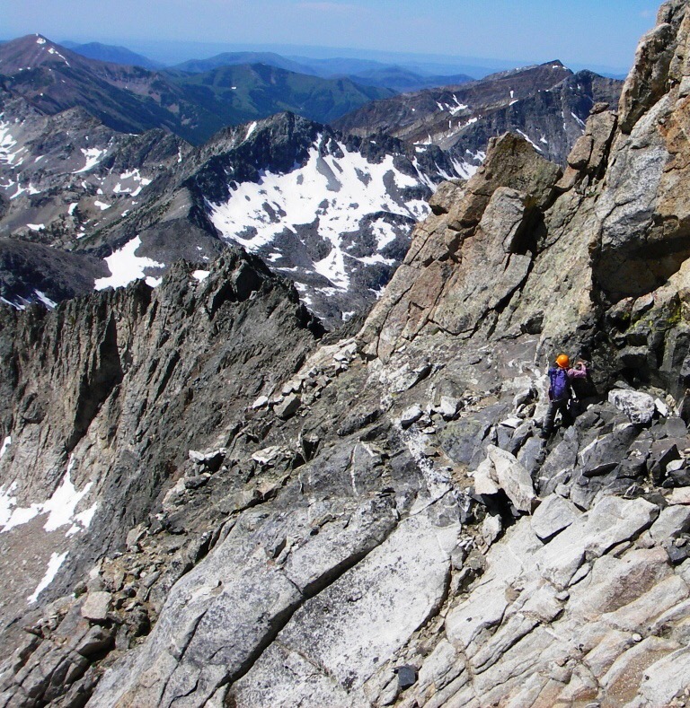 Returning on the black dike traverse. Just around the corner we got out the rope again protect our to climb back down to the ramp/ledge. Judi Steciak Photo