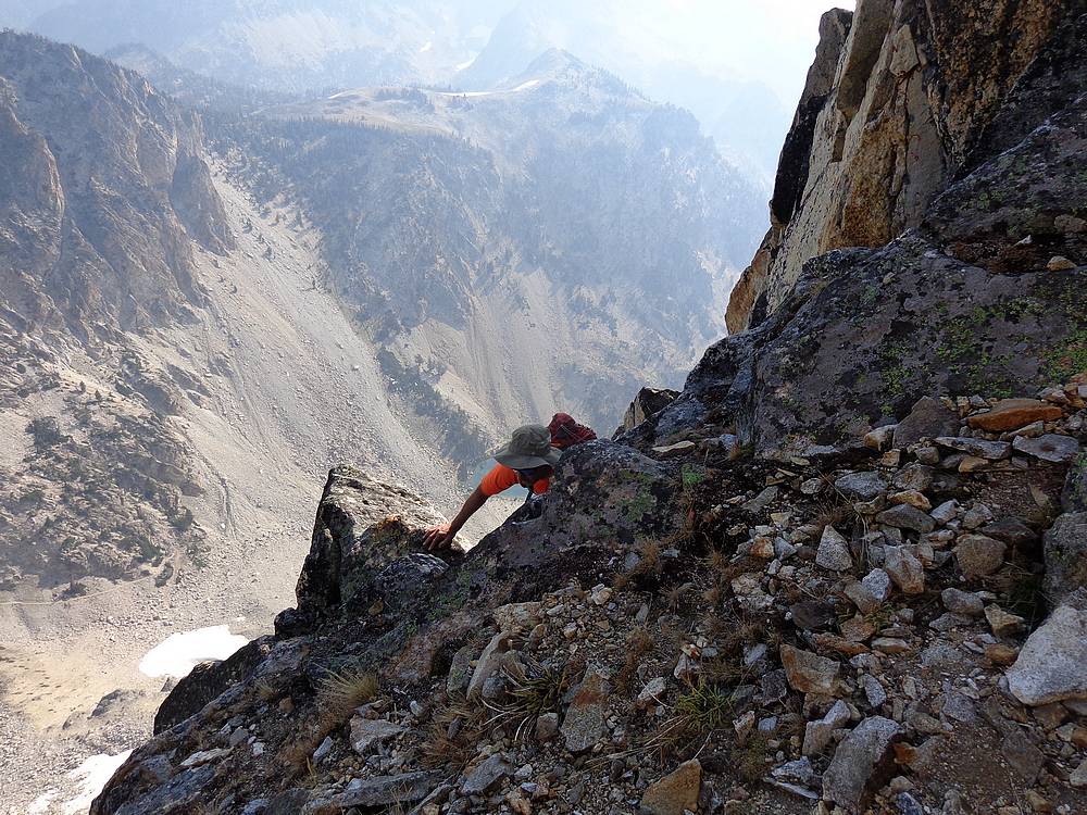 John Fadgen exiting the ledge and entering the final line up the east face. Dave Pahlas Photo 