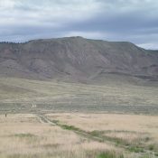 The South Face of Rattlesnake Point, as viewed from the parking pullout near a corral. Livingston Douglas Photo