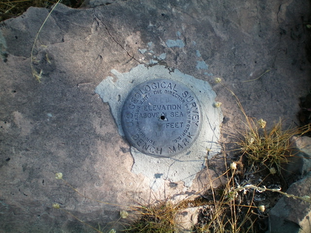 The USGS benchmark atop Red Benchmark. There is another one close by. Livingston Douglas Photo 