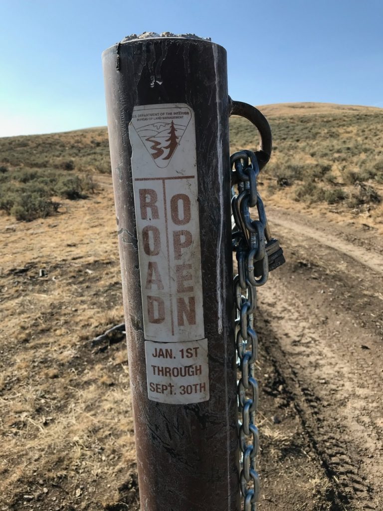 The 4WD road "sign and chain gate" off of Dry Gulch Road. Steve Mandella Photo