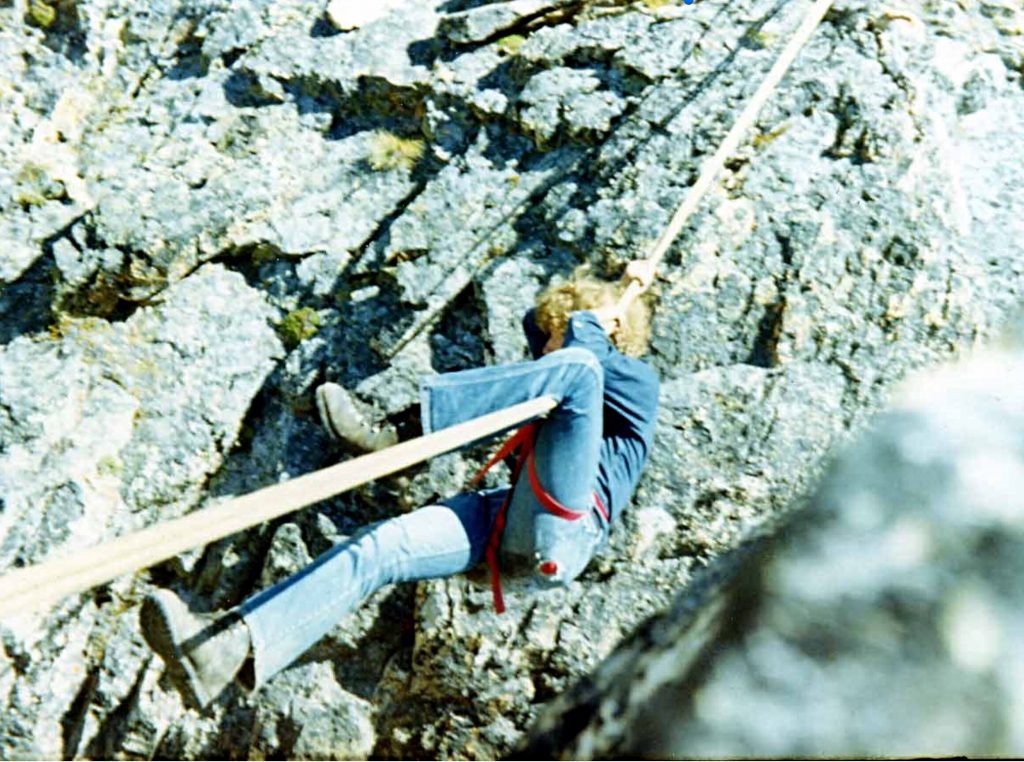 Gordon Williams on a Tyrolian Traverse near the summit of Mt. Reagan. Note the vintage Goldline rope.