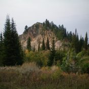 Prospect Peak as viewed from the north. It is a rugged outcrop with a combination of pines, aspens, rock, and brush. Livingston Douglas Photo