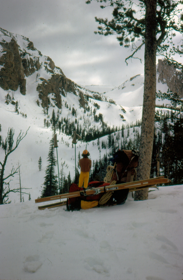 Carl surveying the route on our approach to our base camp. We had state-of-the-art JanSport aluminum frame packs that were a vast improvement over the wood-framed Army surplus packs that were still in use in the 60s and early 70s. I had the standard workhorse of backcountry skis, the Bonna 2400 with lignostone edges. Our bindings were the Silvretta cable bindings with a universal toe that allowed for the use of any stiff soled mountain boot. Some people reported cable breakage with the Silvretta bindings, but we never had any problems. Bob Boyles photo