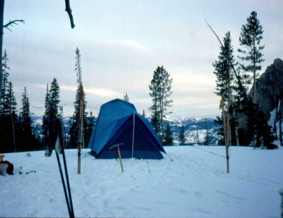 Our base camp high above Stanley Basin. High-quality outdoor gear was limited and expensive in the early 70s so we got some of ours from Frostline, a company that offered sew-your-own kits. The tent is a Frostline Kodiak that came with instructions for two different methods of sewing, the one we choose was the more difficult. We somehow talked my sister into sewing the tent. It took the three of us a month to complete. It turned out to be the best winter tent I've ever used due to good ventilation and the low snow shedding profile. We ended up using it for the next ten years. Bob Boyles photo.