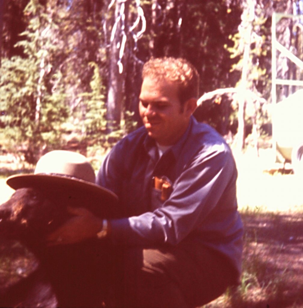 Michael McCollum counseling a problem bear.