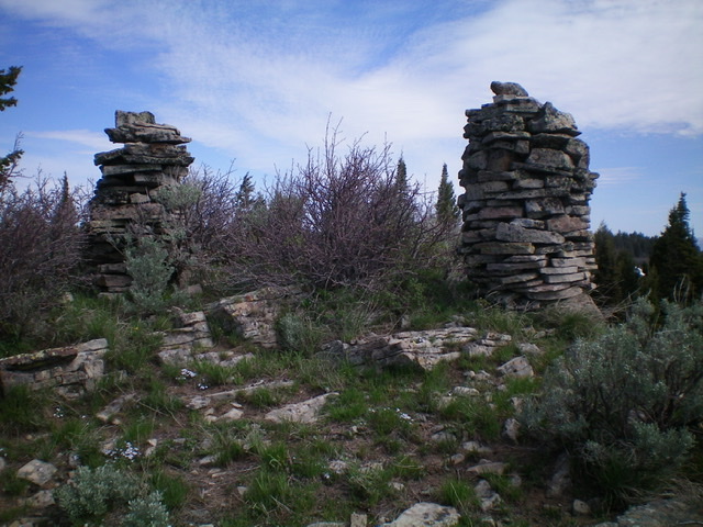 The tall twin cairns atop Peak 7693. Somebody spent some serious time up here constructing these bad boys! Livingston Douglas