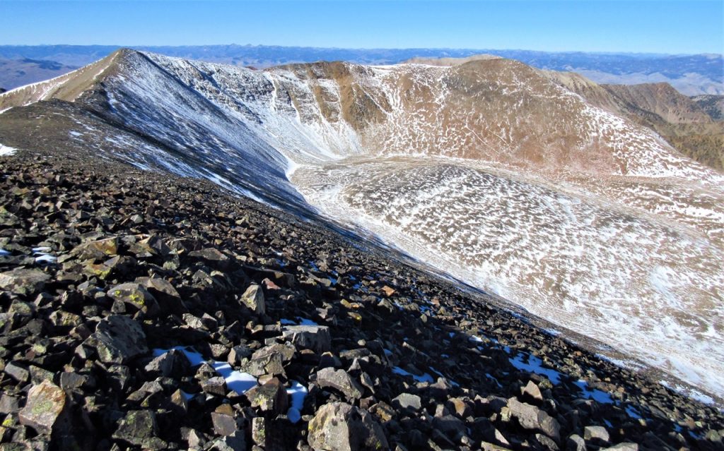 The Long Mountain W ridge traverse gained via the NE ridge of Pt. 10,645 on the right over Pt. 10,696 on the left (Long Mountain W summit). Judi Steciak and Carl Hamke Photo 