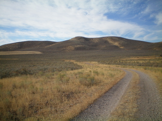 Peak 5578 (summit is left of center) and its northeast ridge (coming at the camera), as viewed from the 2-track BLM road that reaches a field near its base. Livingston Douglas Photo 
