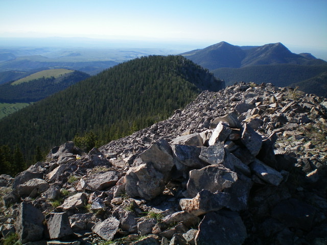 The summit cairn atop Fritz Peak, looking down the southeast ridge. Livingston Douglas Photo 
