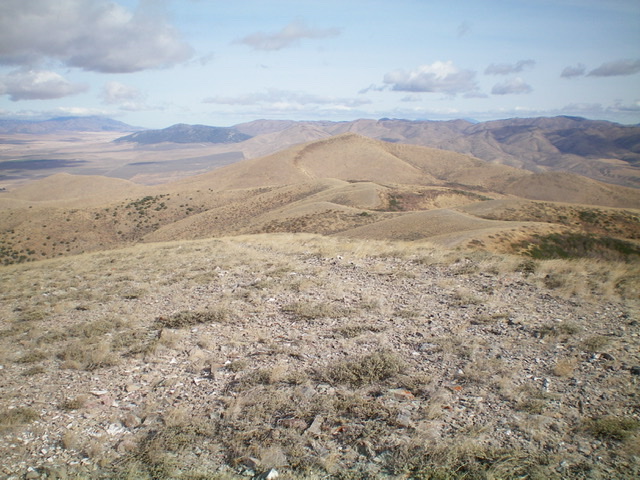 Looking north from the summit of North Hansel Mountains HP. Peak 6774 is in mid-ground (dead center). Livingston Douglas Photo