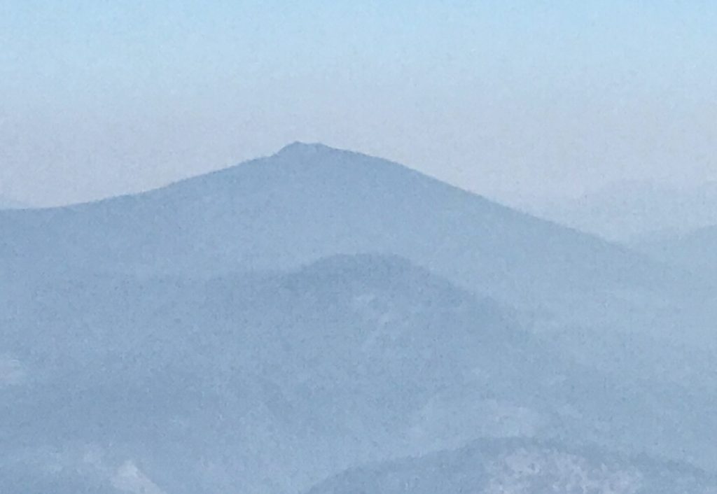 Packsaddle Mountain on a smokey September day in 2018 viewed from North Chilco Mountain.