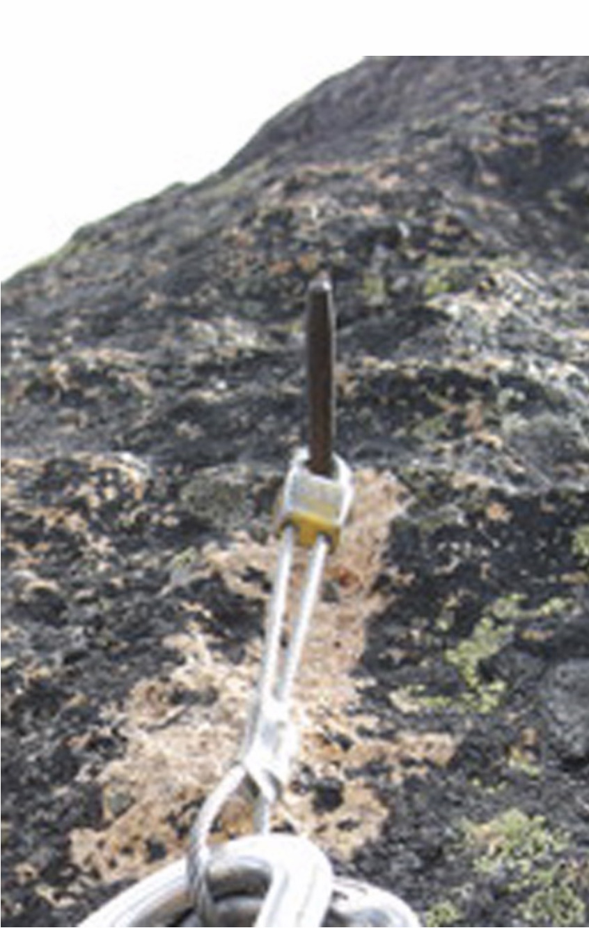 Fred Becky’s drill-bit/critical aid placement, with a modern wired stopper in place of a bolt hanger. Ray Brooks Photo