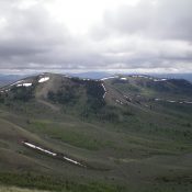 Peak 6840 as viewed from the summit of Peak 6910. The left hump is the high point. Livingston Douglas Photo