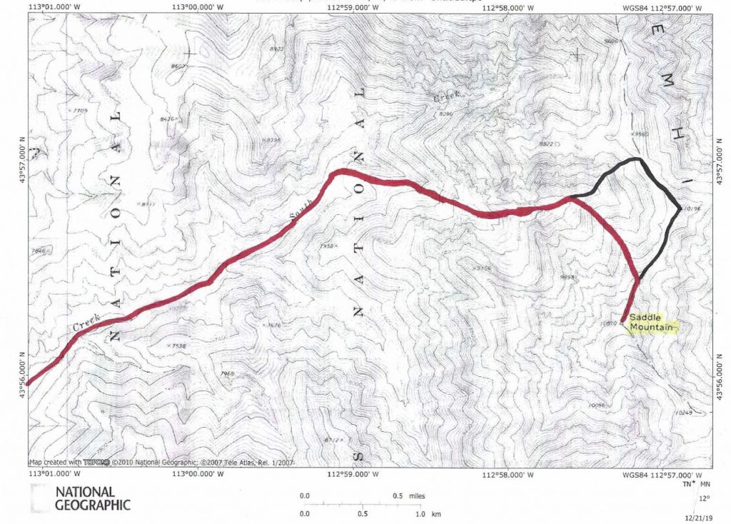 The ascent route (red) and the descent route (black).