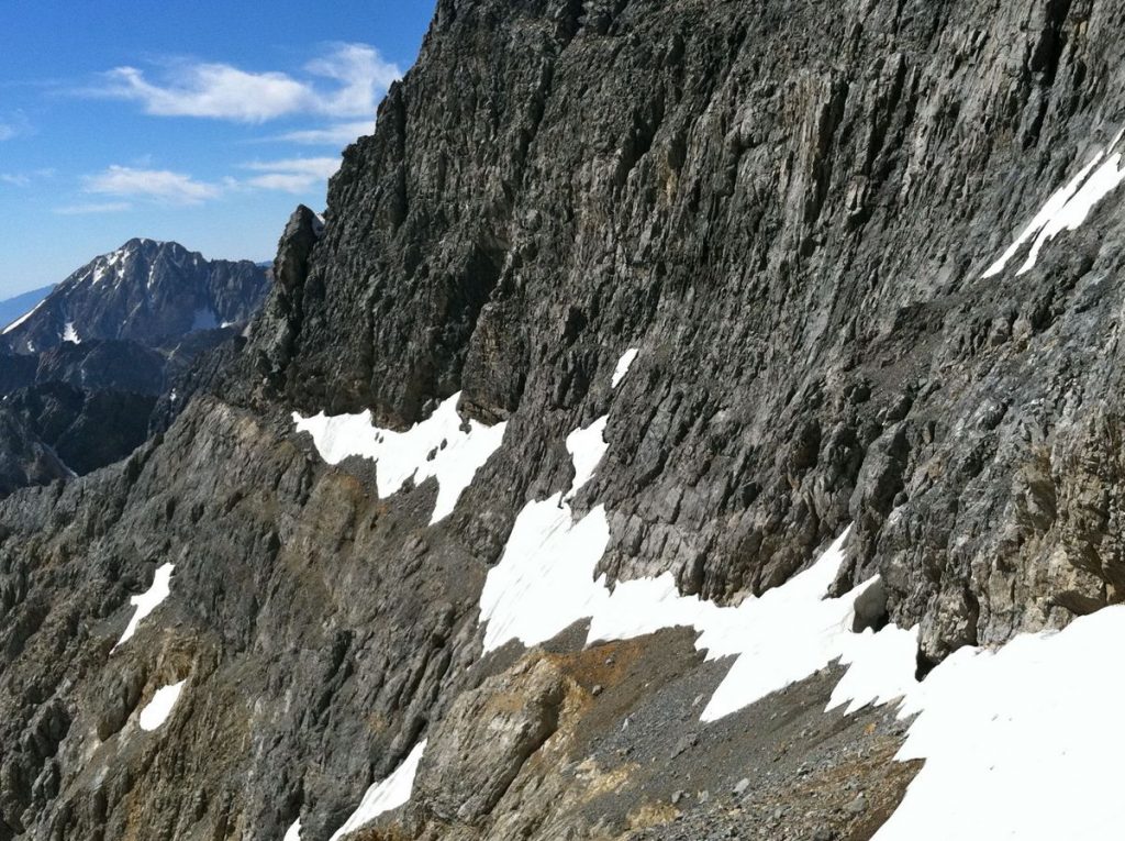 The Dirty Traverse ledge leading out to the East Ridge from the center of the face. Photo - Wes Collins