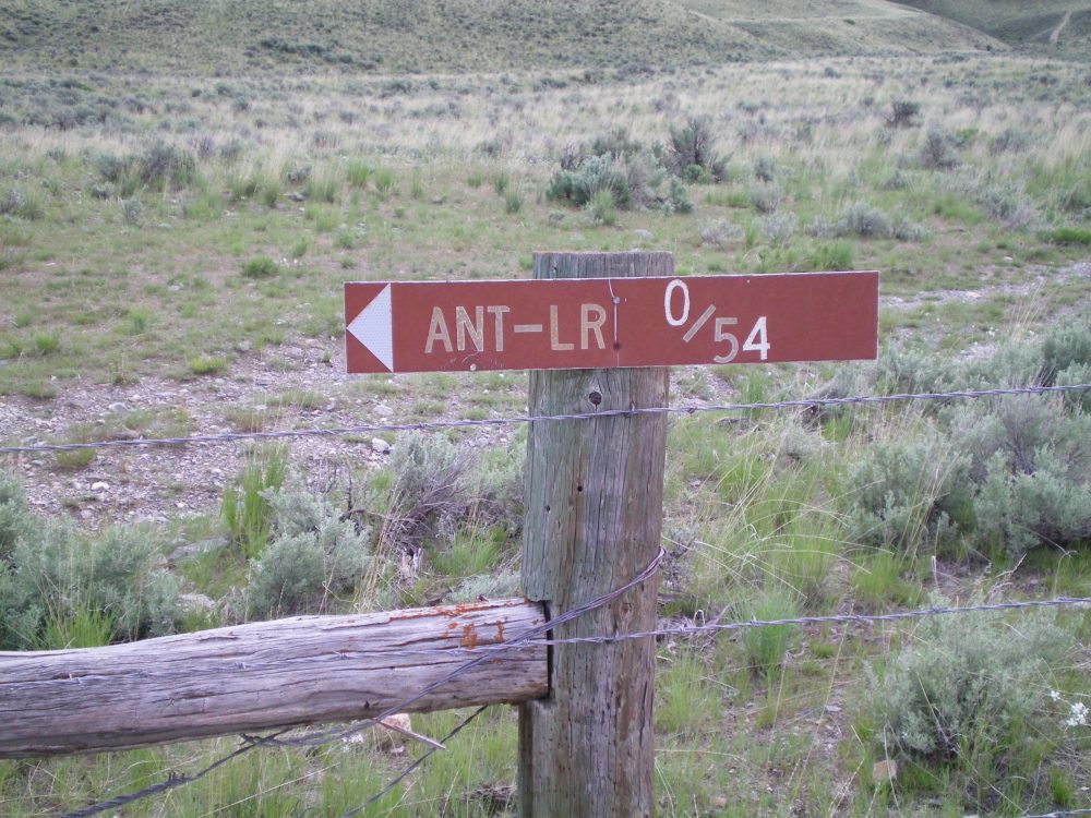 The sign on the R side of the cattle gate at the parking spot for the West Ridge Route. Livingston Douglas Photo