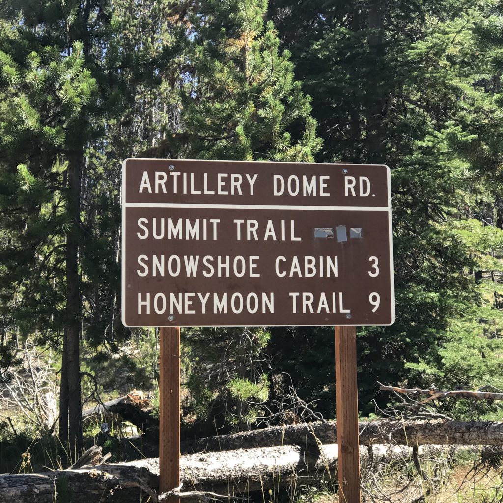 This sign marks the beginning of FS-477E, the Artillery Dome Road.