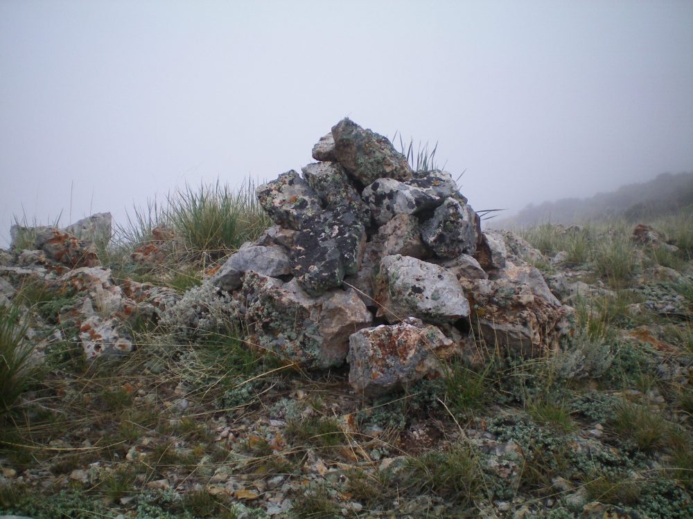 The summit cairn atop Peak 6990. Livingston Douglas Photo