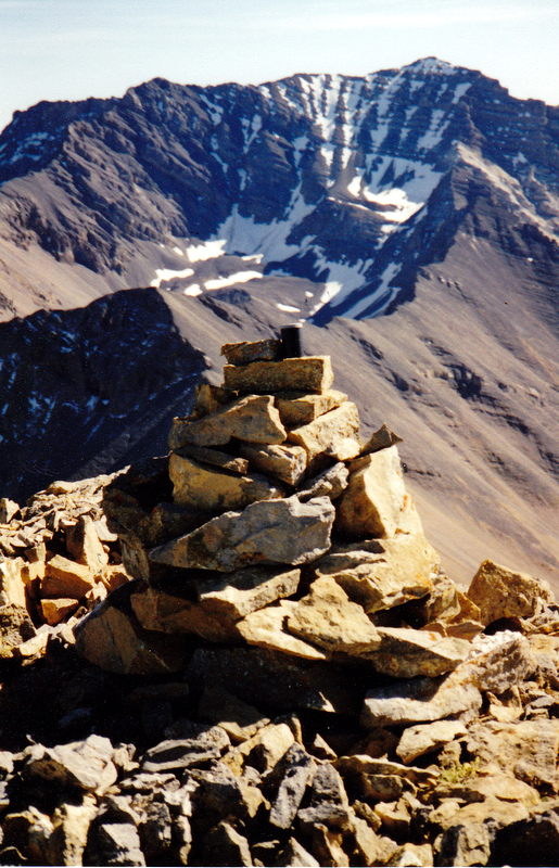 The summit cairn on The Moat looking southeast to the north face of USGS Peak. Follow the ridge from the Moat to Castle Peak and the "brickyard" on the flank of USGS. Rick Baugher Photo