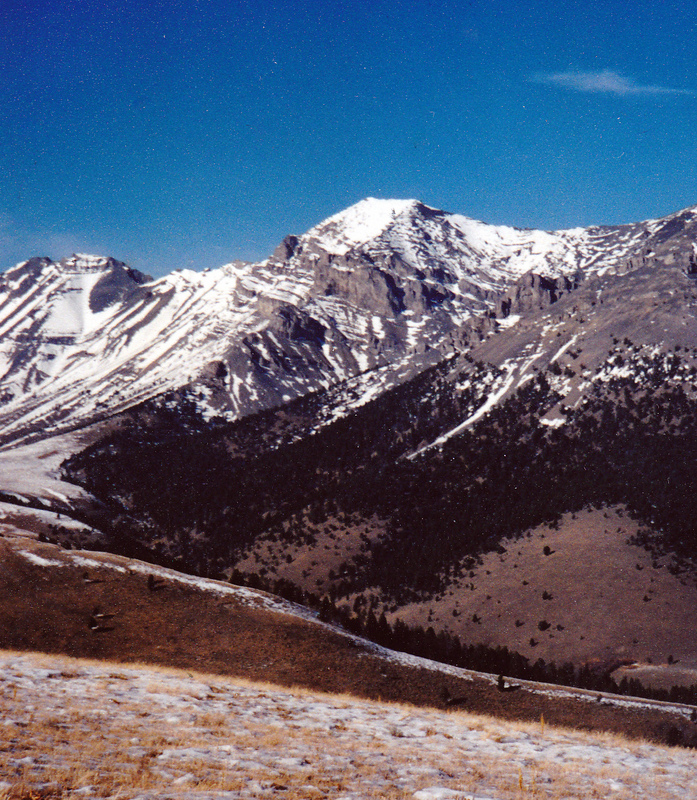 This view is north to Huhs Horn from the Beaverhead Range's southwest divide low point. Italian Peak is on the far left. The Continental Divide Trail leaves the ridge crest midway between Italian Peak and Huhs Horn. Rick Baugher Photo and commentary.