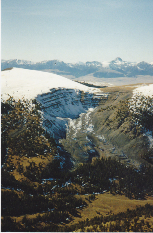 A rather uncommon sight in the southern Beaverhead Range is this evidence of classic U-shaped glaciation found on the north side of Eidelman Peak. This shot was taken from Peak 10404 (Dianes Mountain) on the Idaho/Montana Continental Divide. Rick Baugher Photo and Commentary.